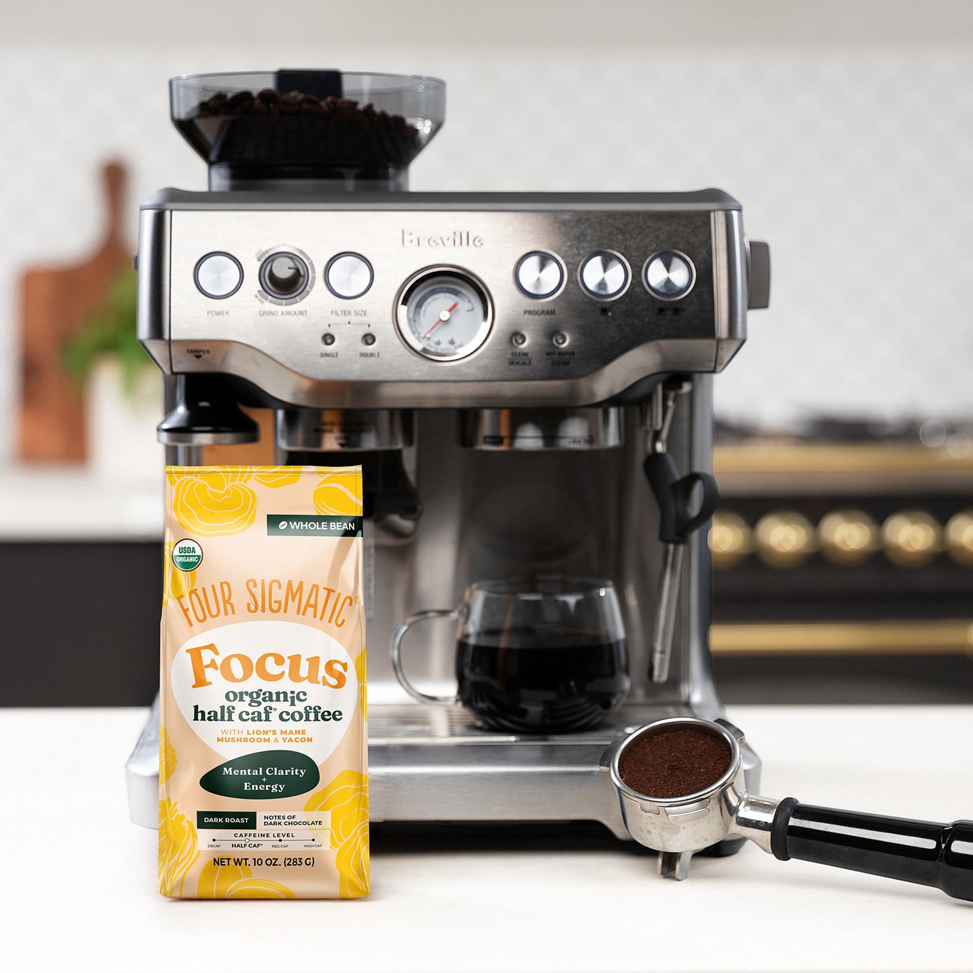 focus-half-caf-whole-bean-coffee-n0 Focus_Org_Dark_Roast_High_Caf_Kitchen_Pour_Woman_4_47b71a0c-c7fc-40fd-a2bc-fa7389dfb410.jpg